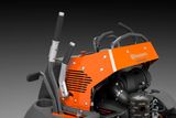 Close-up of a Husqvarna professional ride-on mower control panel and engine.