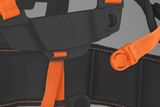 Close-up of a Husqvarna harness with adjustable straps and secure buckles.
