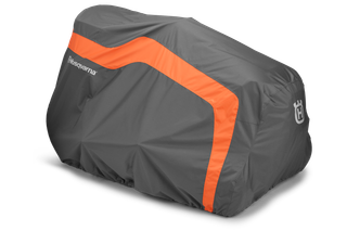 Housse de protection Husqvarna pour équipement de plein air, mettant en valeur le logo de la marque.