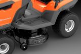 Close-up of a Husqvarna ride-on mower showcasing the ClearCut cutting deck.