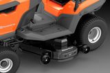 Side view of a Husqvarna ride-on mower with ClearCut cutting deck.