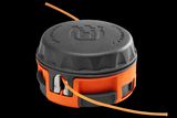Front view of a Husqvarna trimmer head with visible trimmer line.