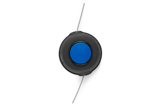 Top view of a trimmer head with visible trimmer line.