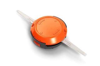 Top view of a Husqvarna trimmer head with visible string attachments.