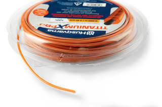 Front view of Husqvarna Titanium Pro trimmer line in packaging.
