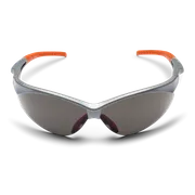 Front view of protective eyewear with tinted lenses and orange temple tips.