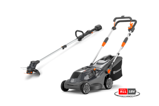 Studio view of a Husqvarna battery lawn mower and grass trimmer with 18V system badge.