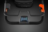 Top view of a Husqvarna lawn mower handle with control panel.