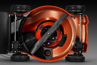 Series of images showing the underside and disassembled parts of a lawn mower.