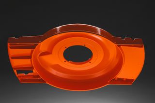 Top view of a lawn mower cutting deck component.