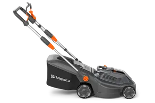 Side view of a Husqvarna battery-powered lawn mower.