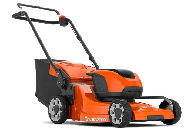 Вигляд збоку на акумуляторну газонокосарку Husqvarna.