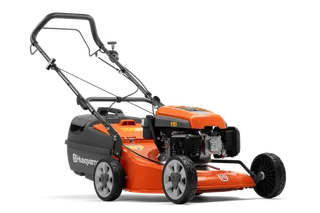 Side view of a Husqvarna lawn mower showcasing its design and engine.