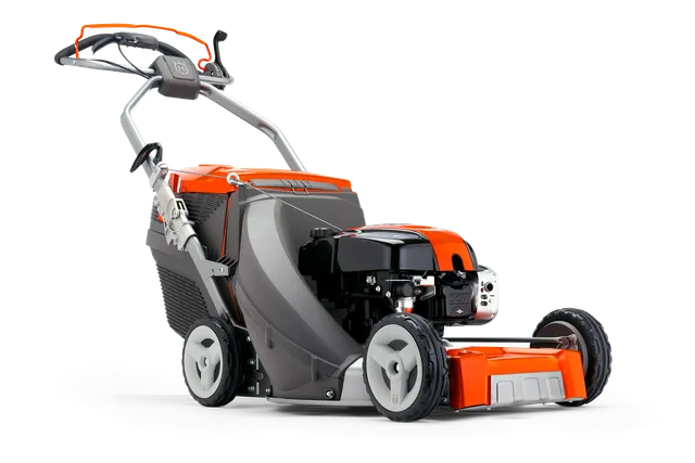 Side view of a Husqvarna walk-behind lawn mower with a grass collection bag.