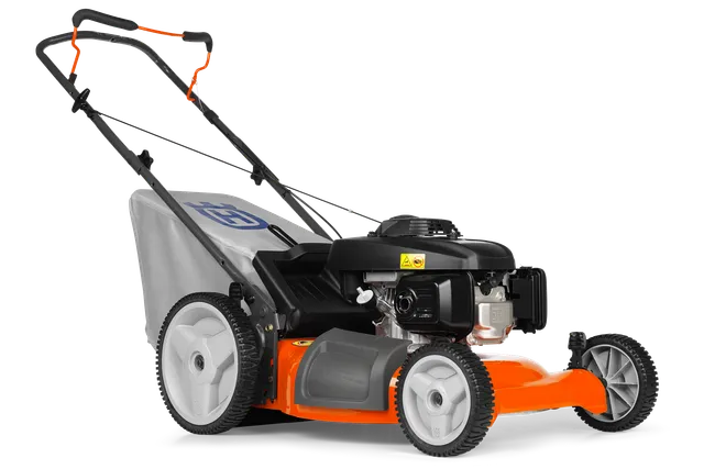 Side view of a lawn mower with a detachable wheel and grass collection bag.