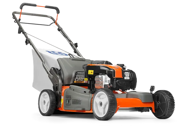 Side view of a lawn mower with visible engine and wheels, showcasing its components.