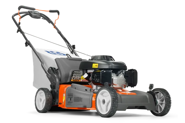 Side view of a lawn mower with visible engine and grass catcher.