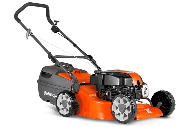 Side view of a Husqvarna lawn mower with visible engine and wheels.