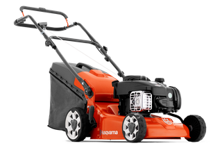 Side view of a Husqvarna lawn mower with a grass collection bag.
