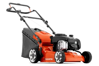 Side view of a Husqvarna lawn mower with a grass collection bag.