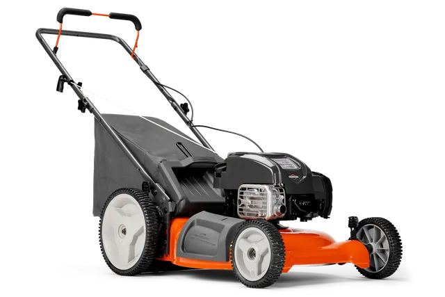 Side view of a lawn mower with a visible engine and grass collection bag.