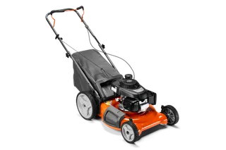 Vista lateral de un cortacésped de empuje manual de Husqvarna con una bolsa de recogida de hierba.