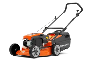 Side view of a Husqvarna lawn mower with a grass collection bag.