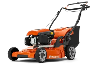Side view of a Husqvarna lawn mower showcasing its engine and cutting deck.