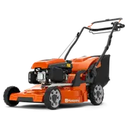 Side view of a Husqvarna lawn mower showcasing its engine and cutting deck.