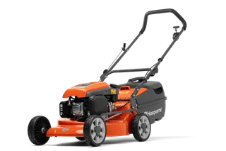 Side view of a Husqvarna lawn mower showcasing its engine and handle design.