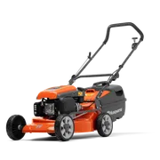 Side view of a Husqvarna lawn mower showcasing its engine and handle design.