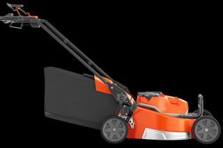 Side view of a Husqvarna battery-powered lawn mower with a grass collection bag.