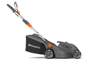 Vue latérale d’une tondeuse à batterie Husqvarna.