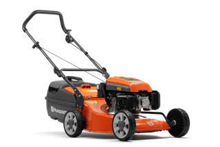 Side view of a Husqvarna lawn mower showcasing its design and features.