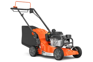 Side view of a Husqvarna lawn mower with a visible engine and grass collection bag.