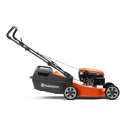 Side view of a Husqvarna lawn mower with grass collection bag.