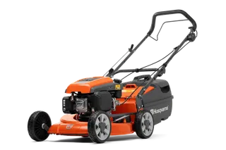 Side view of a Husqvarna lawn mower showcasing its design and features.