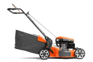 Side view of a lawn mower with a grass collection bag attached.