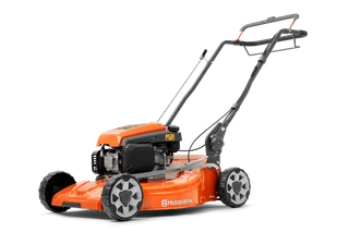 Страничен изглед на косачка Husqvarna с ергономична дръжка.