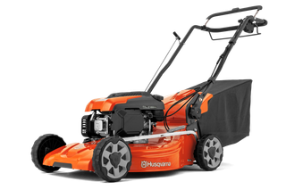 Side view of a Husqvarna lawn mower with a collection bag.