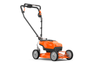 Widok z boku kosiarki akumulatorowej Husqvarna.