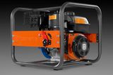 Side view of a Husqvarna construction power generator with visible engine components.