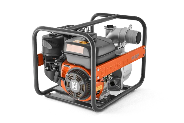 Side view of a Husqvarna water pump with visible engine and piping.