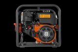 Front view of a Husqvarna portable generator with visible engine components.