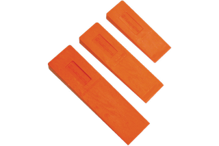 Top view of three Husqvarna felling wedges of different sizes.
