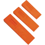Top view of three Husqvarna felling wedges of different sizes.