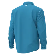 Vue arrière d’une chemise de travail à manches longues avec le logo Husqvarna à l’arrière.