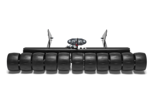 Front view of a construction roller with multiple wheels aligned in a row.
