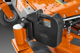 Close-up of a Husqvarna mower's weight attachment system.