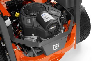 Close-up view of a Husqvarna ride-on mower engine.